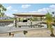 Elevated view of a private boat lift with canopy, offering direct access to the open water at 928 Spindle Palm Way, Apollo Beach, FL 33572