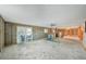 Spacious room with a slider door leading to the outside, offering potential for indoor-outdoor living at 928 Spindle Palm Way, Apollo Beach, FL 33572