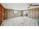 Room with a ceiling fan, a window and slider door for natural light and access to outdoor space at 928 Spindle Palm Way, Apollo Beach, FL 33572
