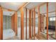Exposed wood framework room with block walls, awaiting personalized finishing and renovation for a custom design at 928 Spindle Palm Way, Apollo Beach, FL 33572