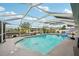 Relaxing screened-in pool area offering a refreshing escape with ample space for lounging and entertaining at 928 Spindle Palm Way, Apollo Beach, FL 33572