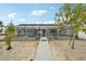 Enclosed pool area featuring a screened-in enclosure, providing a private and enjoyable outdoor space at 928 Spindle Palm Way, Apollo Beach, FL 33572