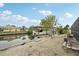 Waterfront view with boat dock providing convenient access to the water for boating and recreational activities at 928 Spindle Palm Way, Apollo Beach, FL 33572