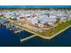Aerial view of waterfront property and canal featuring docks and boat slips at 10315 Cortez W Rd # 38Bv, Bradenton, FL 34210