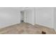 Bedroom with tiled floors, access to additional rooms, closet, and ceiling fan at 10315 Cortez W Rd # 38Bv, Bradenton, FL 34210