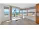 Bright living room with tile floors and sliding glass doors to a waterfront view at 10315 Cortez W Rd # 38Bv, Bradenton, FL 34210
