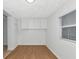 Room with new vinyl flooring, white walls, storage and natural light at 10315 Cortez W Rd # 38Bv, Bradenton, FL 34210