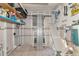 Functional storage area featuring built-in shelving and a pegboard, perfect for organization and accessibility at 10315 Cortez W Rd # 38Bv, Bradenton, FL 34210