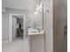 Bright bathroom with double sinks, walk in closet, and clean finishes at 106 N Blvd Of The Presidents, Sarasota, FL 34236