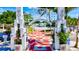 Inviting entrance to Sarasota Bayfront, featuring a red and white brick walkway and lush landscaping at 106 N Blvd Of The Presidents, Sarasota, FL 34236