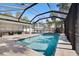 The in-ground screened pool is a refreshing backyard oasis with patio seating at 106 N Blvd Of The Presidents, Sarasota, FL 34236