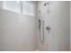 Shower room featuring a rainfall shower head and sleek fixtures at 106 N Blvd Of The Presidents, Sarasota, FL 34236