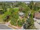 Wooded property lot view from above shows surrounding mature trees and partial driveway at 109 Burney Rd, Osprey, FL 34229