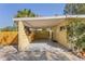 View of the carport showcasing its design and ample space at 109 Burney Rd, Osprey, FL 34229