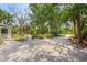 View of the front yard showcasing the landscaping at 109 Burney Rd, Osprey, FL 34229