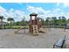 Community playground with slides, swings, and play structures at 11474 Rolling Green Dr, Bradenton, FL 34211