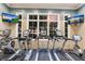 Modern gym with multiple treadmills and ellipticals for a complete cardio workout at 11739 River Shores Trl, Parrish, FL 34219