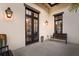 Charming outdoor patio featuring stylish lighting, a cozy bench, and easy access to interior spaces, perfect for relaxation at 11739 River Shores Trl, Parrish, FL 34219