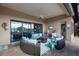 Inviting patio with comfortable seating and a view to the waterfront at 11739 River Shores Trl, Parrish, FL 34219