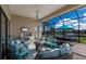 Relaxing patio with plenty of seating overlooking a picturesque canal at 11739 River Shores Trl, Parrish, FL 34219