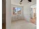 Bedroom with a large window offering nice natural light and view of the neighborhood at 118 9Th N St, Bradenton Beach, FL 34217