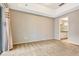 A bright bedroom with a sliding glass door providing access to the patio and an ensuite bath at 11831 Brookside Dr, Bradenton, FL 34211