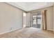 A bright bedroom with a sliding glass door providing access to the patio at 11831 Brookside Dr, Bradenton, FL 34211