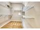 A walk-in closet with carpet, shelving, and ample storage space at 11831 Brookside Dr, Bradenton, FL 34211
