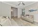 Cozy living room featuring elegant decor, a ceiling fan, and an inviting seating area at 12448 Golden Sage Dr, Sarasota, FL 34238