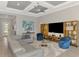 Cozy living room with an open layout, recessed lighting, and a view of the front entryway at 12448 Golden Sage Dr, Sarasota, FL 34238