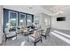 Relaxing lounge area with comfortable seating, large windows, and bright sunlight at 12448 Golden Sage Dr, Sarasota, FL 34238