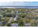 A scenic view highlights the neighborhood's proximity to the bay, nestled among lush greenery and clear blue skies at 1302 5Th W St, Palmetto, FL 34221