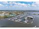 Overhead shot of a marina with boats, water and buildings in the distance at 1302 5Th W St, Palmetto, FL 34221