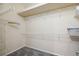 Spacious walk-in closet with carpet flooring, white wire shelving for optimal storage and organization at 14150 Cattle Egret Pl, Lakewood Ranch, FL 34202