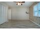 Bedroom featuring a window with shutters, wood flooring, ceiling fan, and a large closet at 1511 S Knollwood Dr, Bradenton, FL 34208