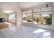 Bright bonus room with large windows, providing plenty of natural light and beautiful backyard views at 1511 S Knollwood Dr, Bradenton, FL 34208