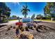 Landscaped entrance to the River Isles community, a 55+ community with a golf course at 1511 S Knollwood Dr, Bradenton, FL 34208