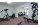 Well-equipped gym features treadmills, bikes, and weight machines for a complete workout experience at 1511 S Knollwood Dr, Bradenton, FL 34208