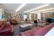 Well-stocked library boasts comfortable seating and tables for reading and learning at 1511 S Knollwood Dr, Bradenton, FL 34208