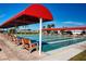 Covered shuffleboard courts offer recreation and relaxation in a tranquil setting at 1511 S Knollwood Dr, Bradenton, FL 34208