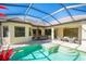 Inviting outdoor space with a sparkling pool and ample seating for relaxation and entertaining at 15403 Leven Links Pl, Lakewood Ranch, FL 34202
