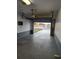 The spacious garage has room for vehicle parking and storage at 1717 Alton Rd, Port Charlotte, FL 33952