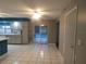 Bright kitchen with views of a beautiful pool area through sliding glass doors at 1717 Alton Rd, Port Charlotte, FL 33952