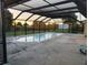 Outdoor pool surrounded by a screened enclosure, ideal for year-round swimming and relaxation at 1717 Alton Rd, Port Charlotte, FL 33952