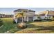 Spacious backyard with a screened lanai, perfect for outdoor relaxation at 17703 Savory Mist Cir, Bradenton, FL 34211