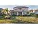 Enjoy the outdoors with a screened lanai and beautifully landscaped backyard at 17703 Savory Mist Cir, Bradenton, FL 34211