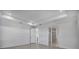 Open main bedroom showcasing neutral walls and an ensuite bathroom at 17703 Savory Mist Cir, Bradenton, FL 34211
