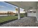 Screened patio with brick flooring overlooking the water at 17703 Savory Mist Cir, Bradenton, FL 34211