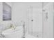 Luxurious bathroom features a soaking tub and a glass-enclosed walk-in shower at 2283 Arlington St, Sarasota, FL 34239