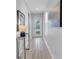 Bright entryway showcasing modern decor and a view to the front yard at 2283 Arlington St, Sarasota, FL 34239